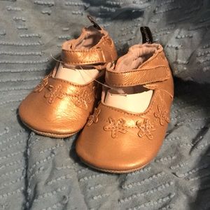 Tommy Tickle gold cruzer crib shoe